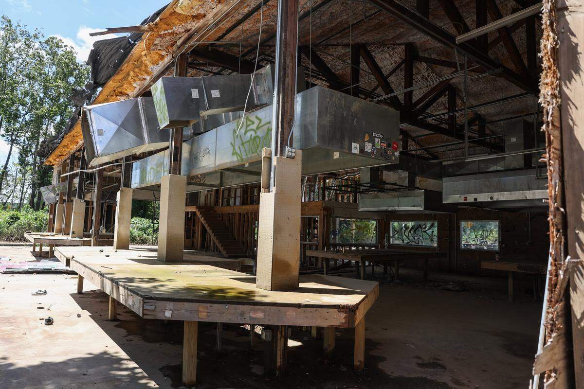 Level 42 Gallery & Studio in the River Arts District in Asheville stands gutted this month, due to historic flooding from the French Broad River last year.