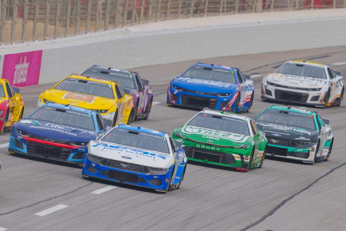 Feb 23, 2025; Hampton, Georgia, USA; Todd Gilliland (34) fights for position going into turn one at Atlanta Motor Speedway.