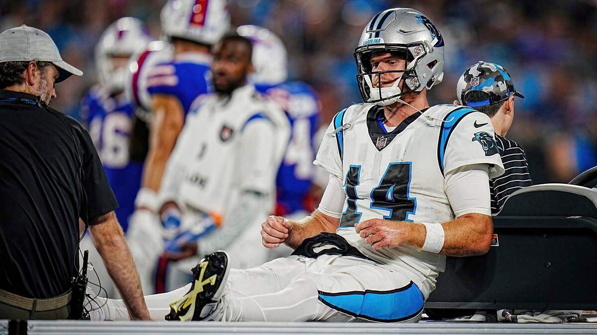 Carolina Panthers quarterback Sam Darnold (14) is carted off the field during an NFL preseason football game against the Buffalo Bills on Friday, Aug. 26, 2022, in Charlotte, N.C. Darnold suffered a high ankle sprain on the play.