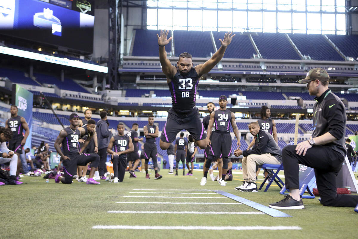North Carolina defensive back M.J. Stewart participates in the broad jump at February's NFL scouting combine in Indianapolis.