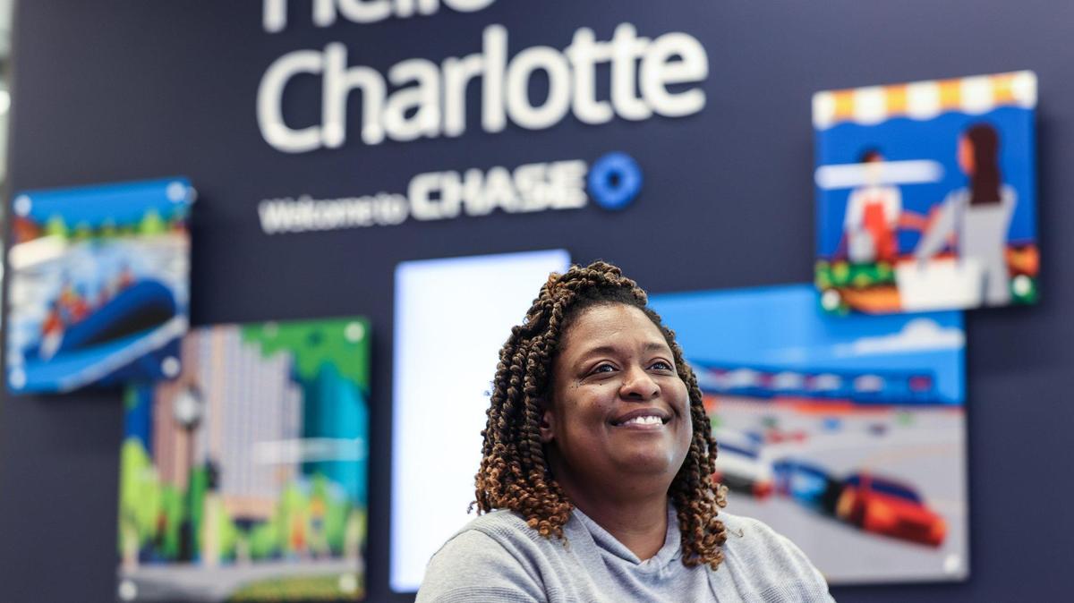 Nicole Byers poses for a portrait at the JP Morgan Chase branch on Beatties Ford Road in Charlotte on Monday.