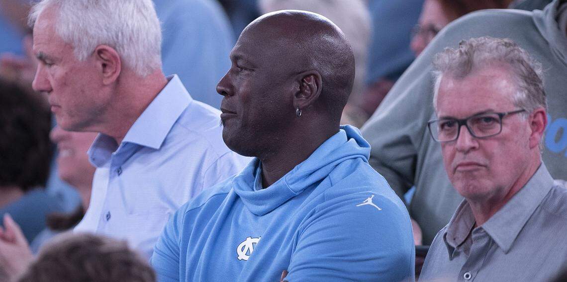 Former North Carolina basketball players Mitch Kupchak, left, Michael Jordan and Buzz Peterson attend Monday’s ACC basketball game in Chapel Hill, where the Tar Heels lost to Virginia at the Smith Center. Jordan, owner of the Charlotte Hornets, and Peterson, assistant general manger, have been friends since the early ’80s.