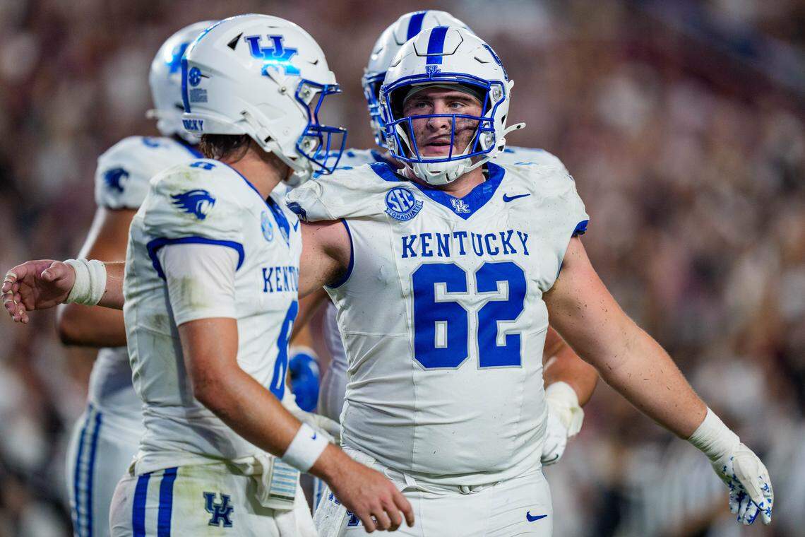 Kentucky Wildcats center Jager Burton comforts quarterback Cutter Boley after an interception in the first half against the South Carolina Gamecocks during their game at Williams-Brice Stadium on September 27, 2025 in Columbia, South Carolina. (Photo by Jacob Kupferman/Getty Images)