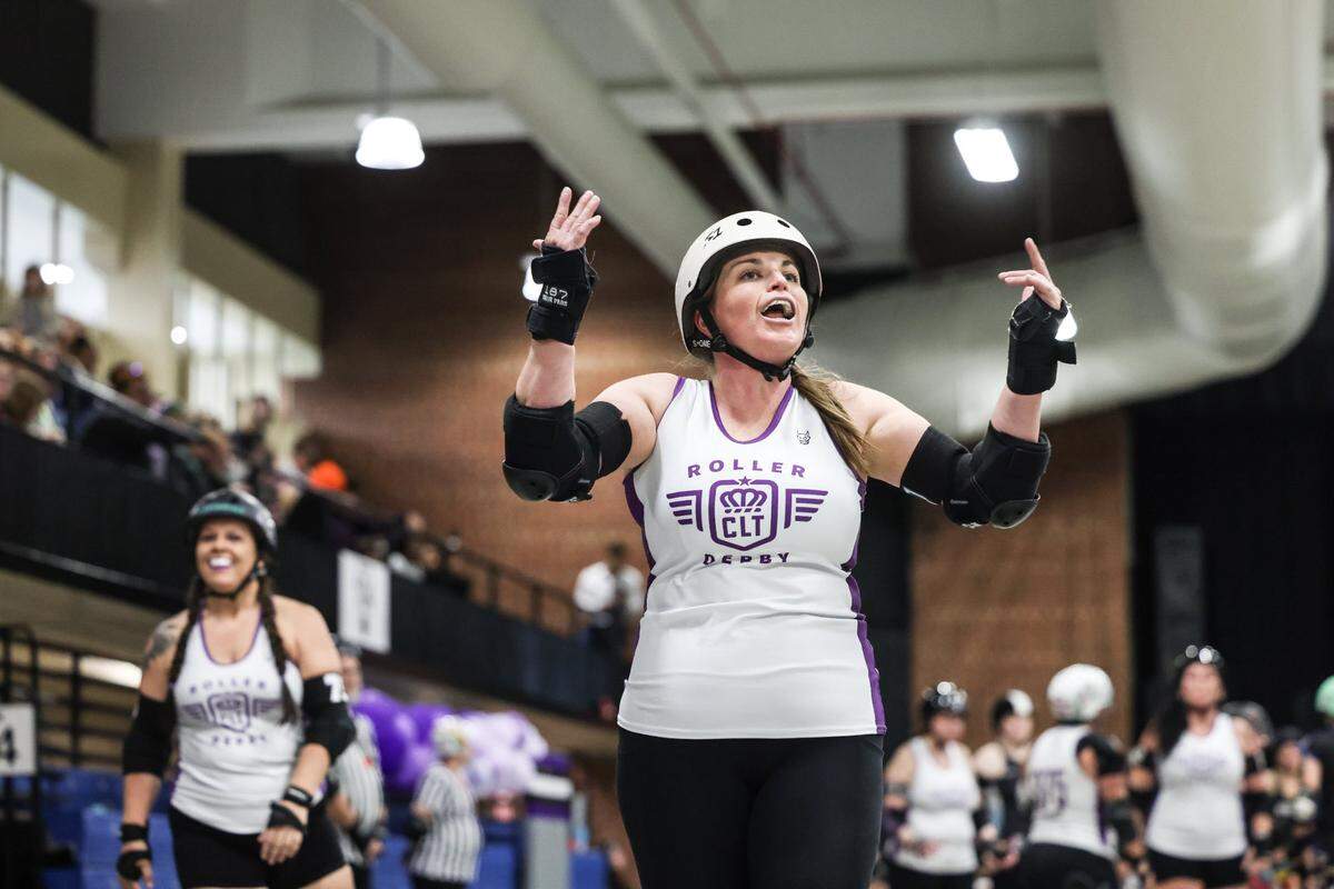 Megan “Miso Fierce” Tyson hypes up the fans during a bout in Charlotte, N.C., on Saturday, March 11, 2023.