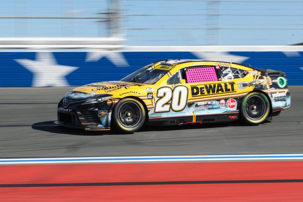 Christopher Bell races down the backstretch during the Rovel 400 at Charlotte Motor Speedway on Sunday, October 8, 2023 in Charlotte, NC.