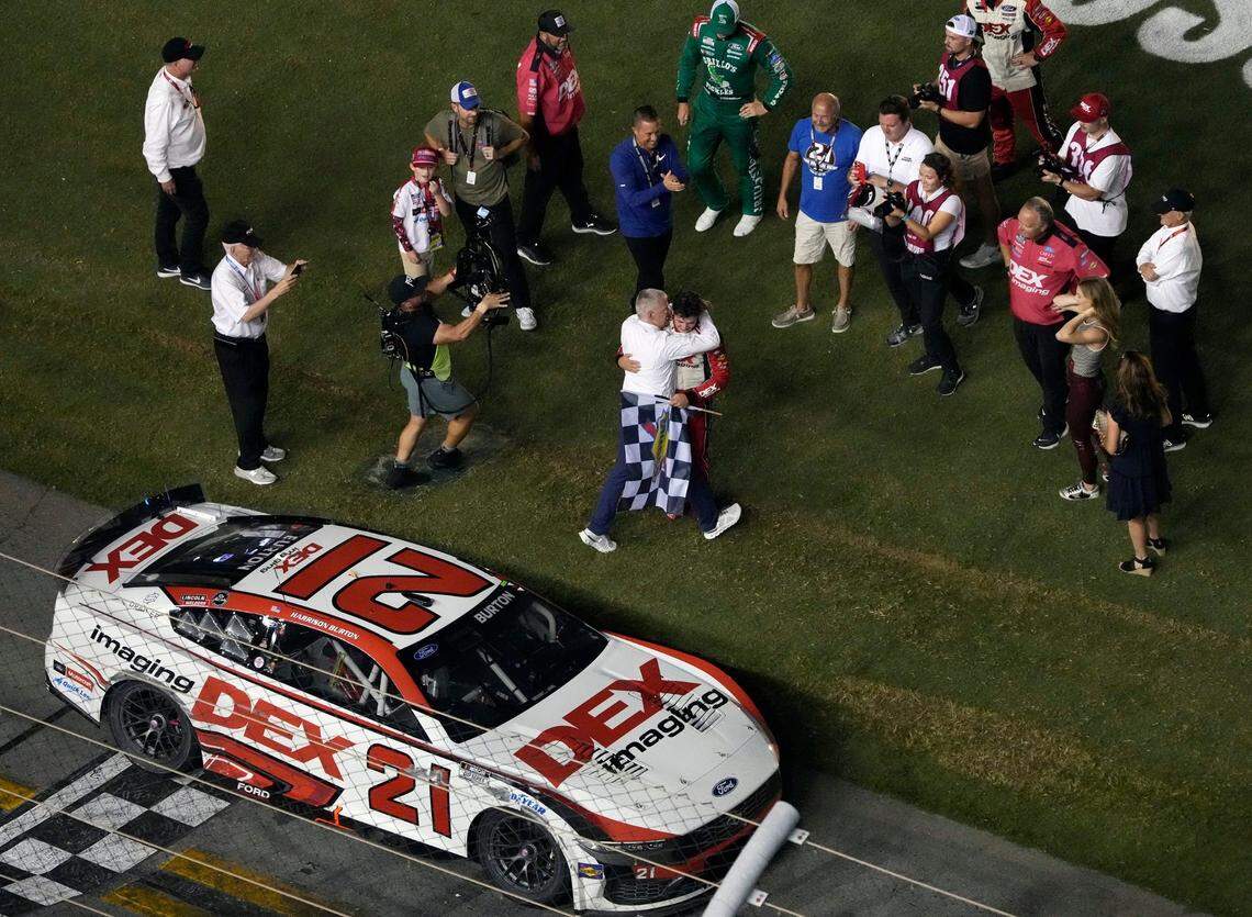 Harrison Burton celebrates winning the NASCAR Coke Zero Sugar 400 at Daytona International Speedway, Saturday, Aug. 24, 2024.