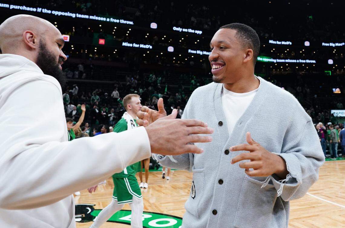 Boston Celtics guard Derrick White (9) with former teammate Charlotte Hornets forward Grant Williams (2) after the game  at TD Garden.