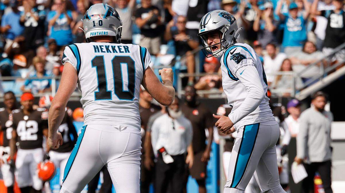 Carolina Panthers place kicker Eddy Pineiro (4) celebrates a field goal with Carolina Panthers punter Johnny Hekker (10) in the fourth quarter during a game against the Cleveland Browns at Bank of America Stadium in Charlotte, N.C., Sunday, Sept. 11, 2022.