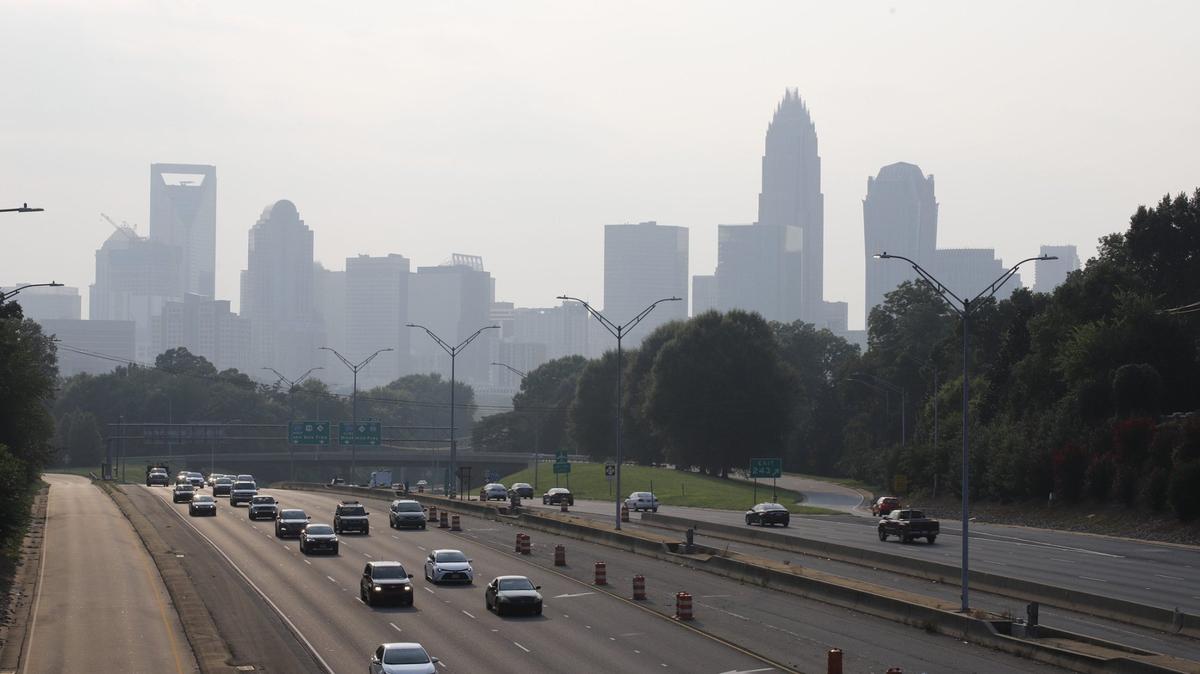 A hazy sky is seen in uptown Charlotte on Wednesday July 21, 2021. Charlotte region is under a Code Orange air quality alert as smoke from the wildfires in Western states makes its way east.