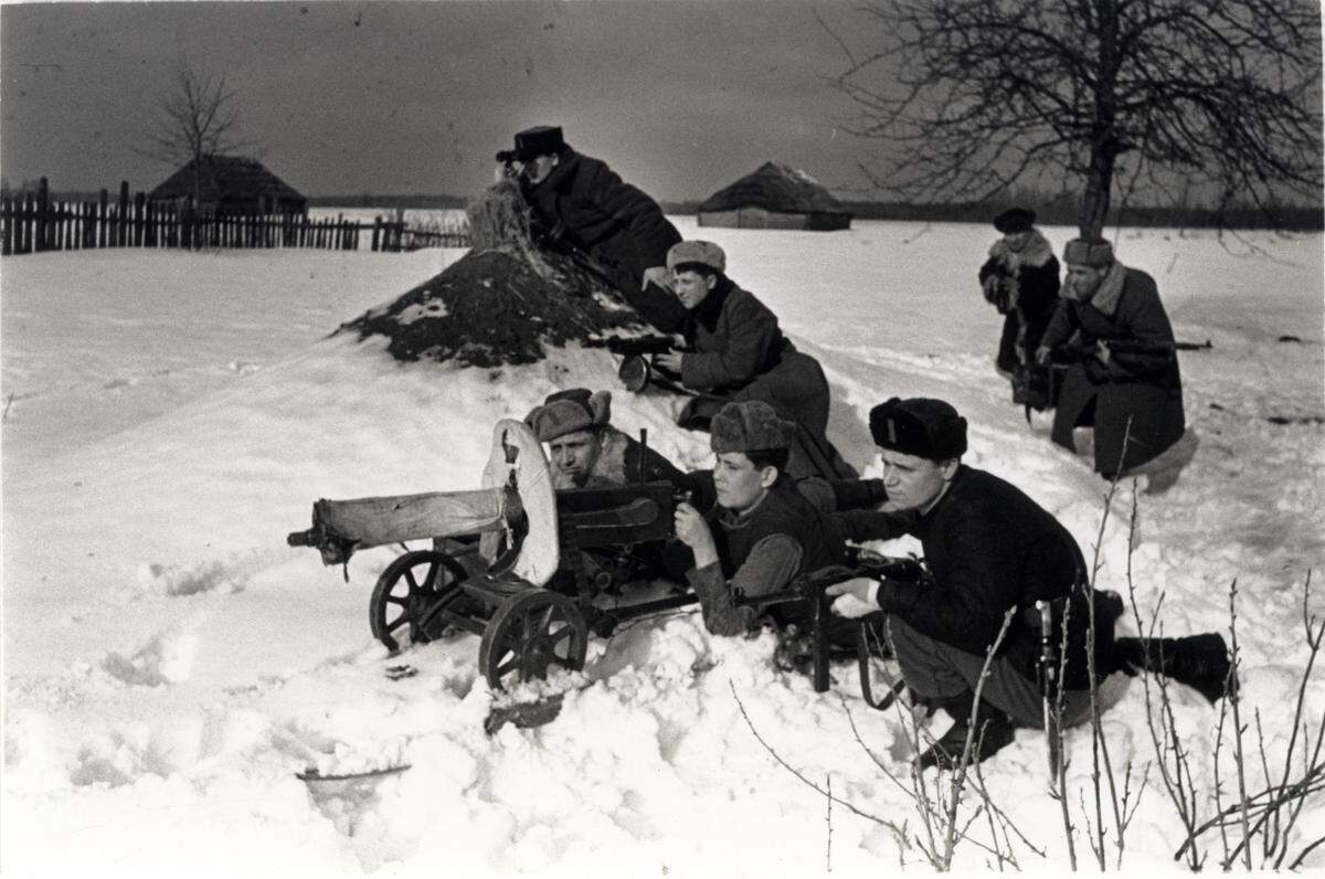 Soviet partisans setting up an ambush in the snow in World War II.