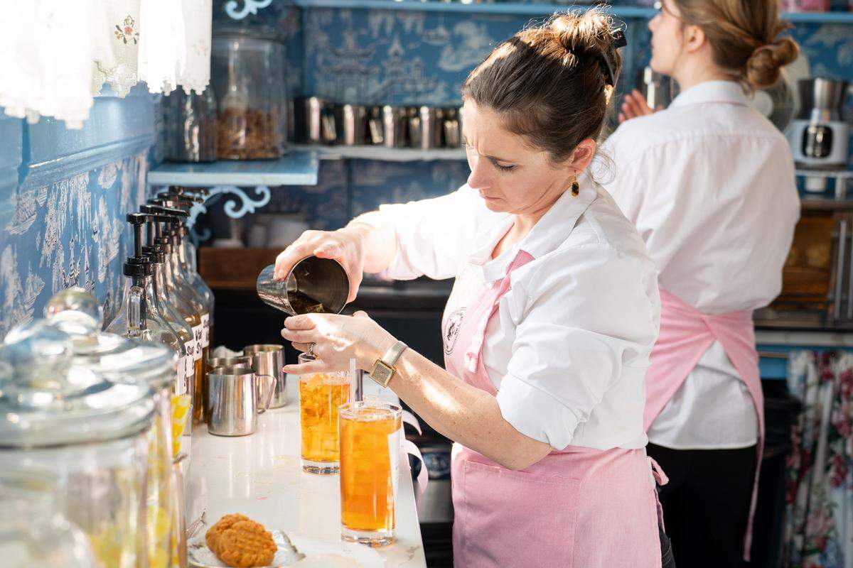 Melissa Speck makes an order at A Cause For Tea.