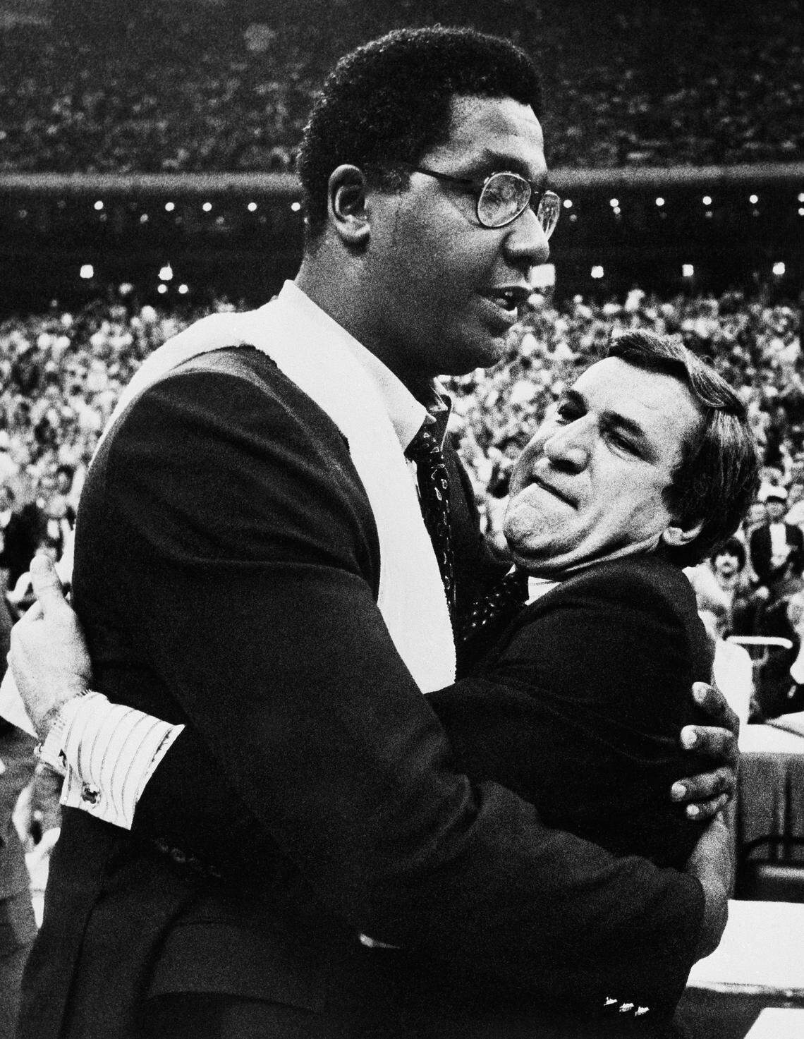 John Thompson (left) first got to know Dean Smith in 1970 when Smith was recruiting a high school player named Donald Washington who Thompson had become the legal guardian for following the death of Washington’s mother.
