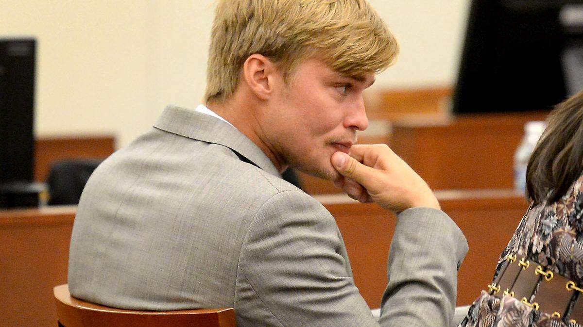 Kevin Olsen sits at the defense table Tuesday during jury deliberations in his rape trial. Olsen, a former UNC Charlotte quarterback, is charged with three counts of second degree rape and one count of criminal sexual offense in connection with an alleged February 2017 assault on his girlfriend. No verdict was returned Tuesday. The jurors will resume their discussions at 9 a.m. Wednesday
