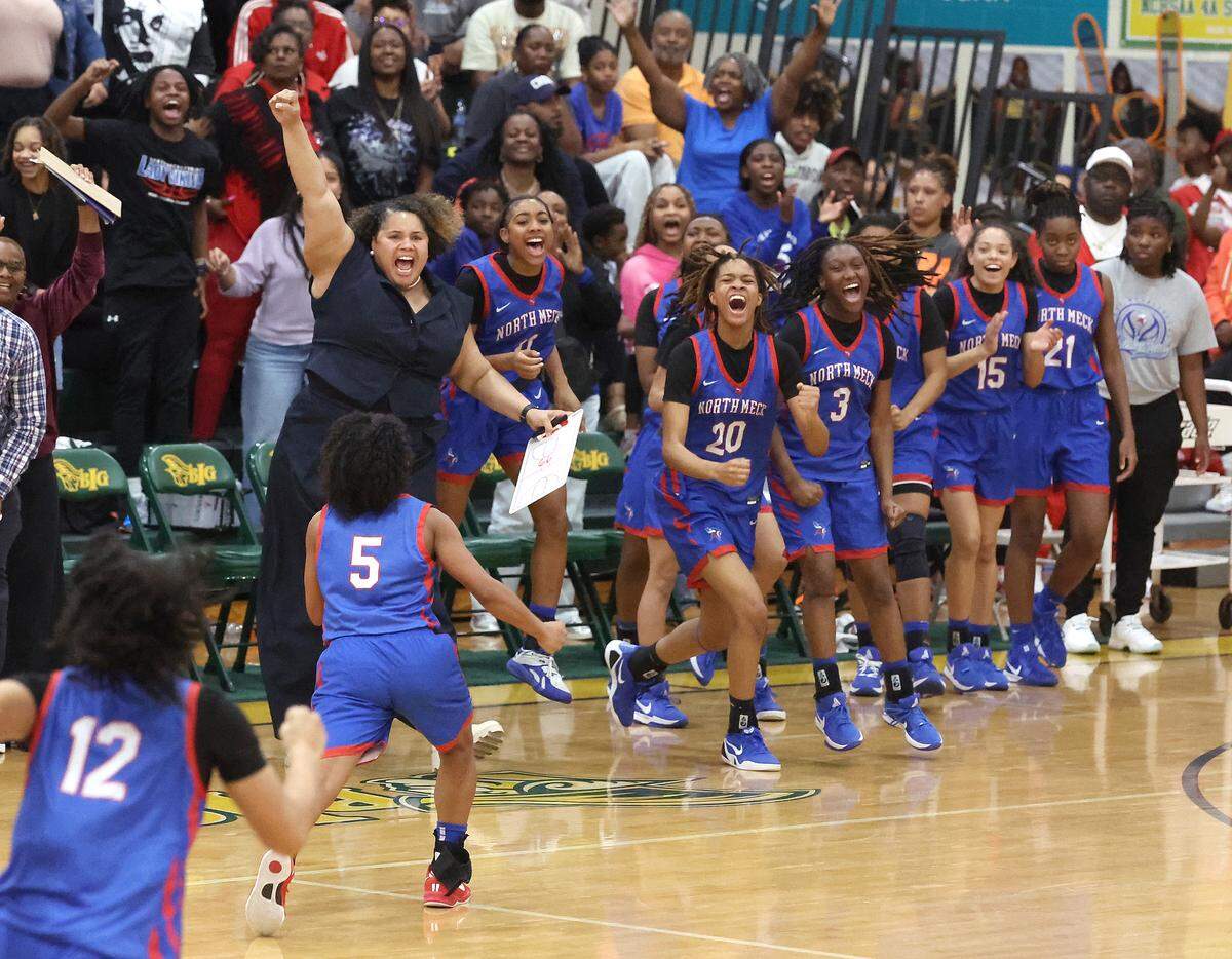 The North Meck girls’ basketball team celebrates its win over Mallard Creek in the Power Six Conference Tournament on Feb. 20, 2026, at Independence High School.