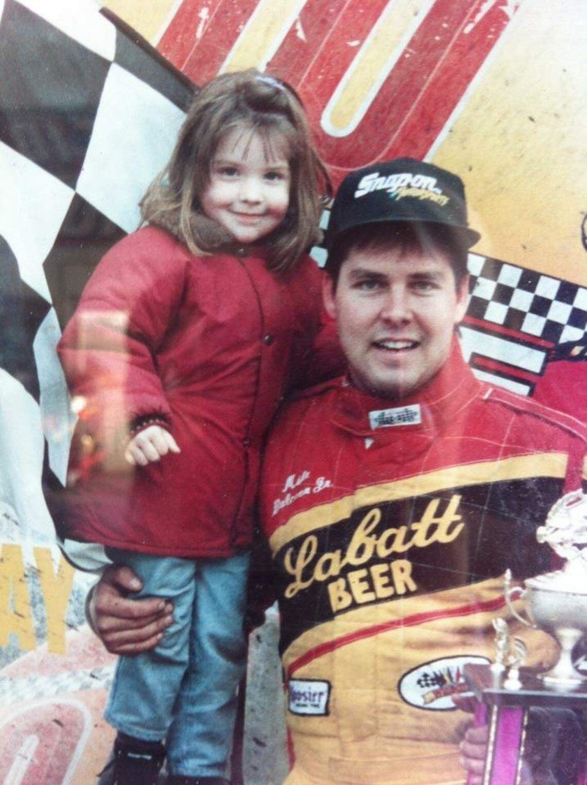 “I kept bugging him,” says Amber Balcaen, pictured with her father Mike at age 3 in 1995. “Everyone kind of assumed that my dad would have pushed me into racing, but it was actually the opposite. I begged him to let me race.”