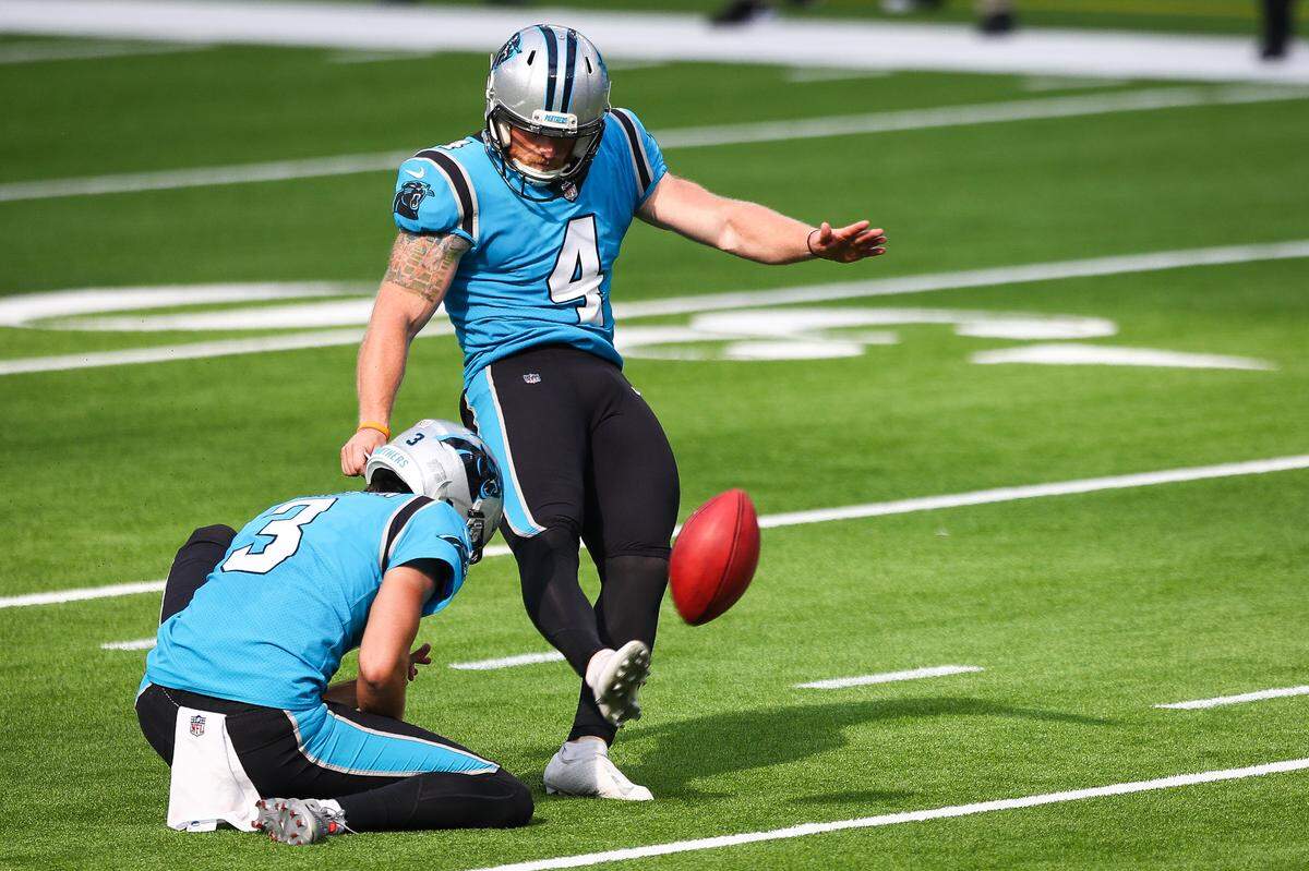 Carolina Panthers kicker Joey Slye (4) kicks a field goal for a 21-10 lead over the Los Angeles Chargers in the fourth quarter at SoFi Stadium . Slye ended up with five field goals and a textbook tackle on a kickoff.