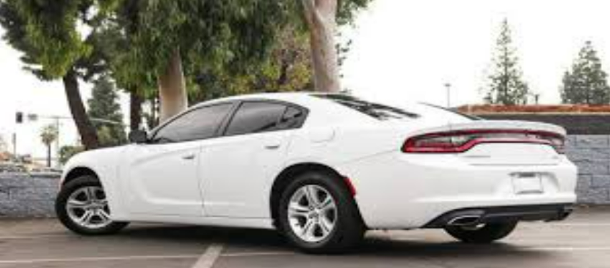 Police in Gaston County are asking for the public’s help in finding a white Dodge Charger, similar to this one. The vehicle may have been involved in a fatal shooting on Interstate 85.