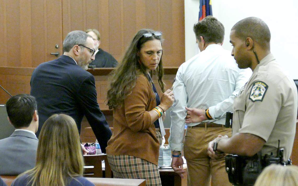 Natalie Howell (center) and Thomas Howell, parents of slain UNC Charlotte student Riley Howell, stood before Superior Court Judge Robert Bell to talk about their son and the slaying prior to the judge sentencing Trystan Terrell. The 22-year-old suspect, former UNC Charlotte student Trystan Andrew Terrell, entered a guilty plea during his arraignment before Superior Court Judge Robert Bell in a Mecklenburg County courtroom. Terrell is accused of killing 19-year-old Reed Parlier of Midland and 21-year-old Riley Howell of Waynesville and of shooting 4 other students. Terrell’s arraignment hearing was held on Thursday, Sept. 19, 2019.