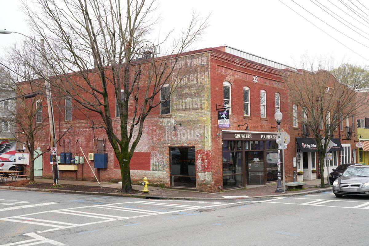 Jamie Brown and Jeff Tonidandel own Growlers Pourhouse, Reigning Doughnuts, Crepe Cellar, Haberdish and the not-yet-opened Supperland.
