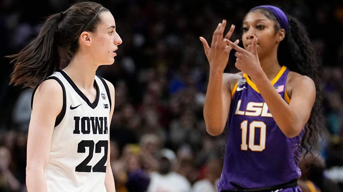 LSU’s Angel Reese reacts in front of Iowa’s Caitlin Clark during the second half of the NCAA Women’s Final Four championship basketball game Sunday, April 2, 2023, in Dallas. LSU won 102-85 to win the championship. 