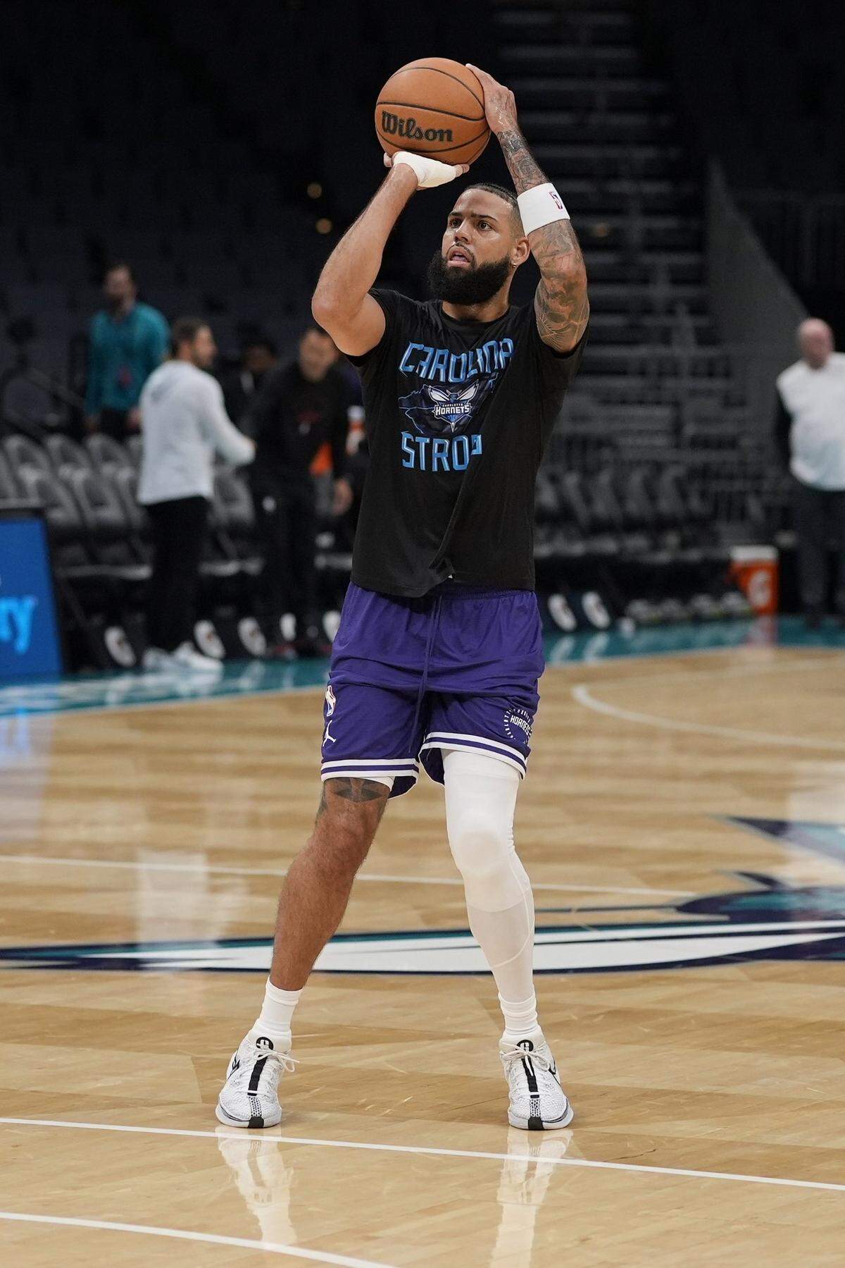 Charlotte Hornets forward Cody Martin (11) during pregame warm ups against the Miami Heat at Spectrum Center.