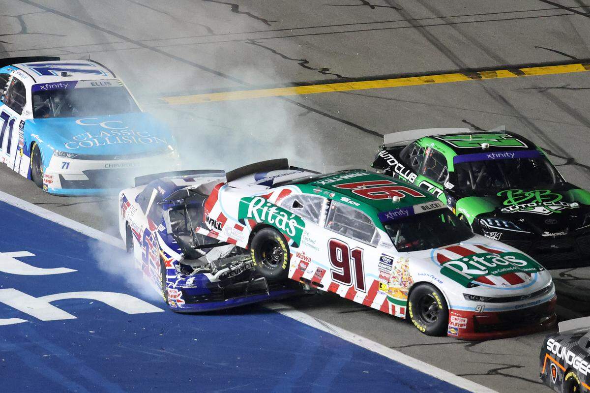 Feb 15, 2025; Daytona Beach, Florida, USA; Xfinity Series driver Kris Wright (5) crashes into driver Josh Bilicki (91) on pit road during the United Rentals 300 at Daytona International Speedway. Mandatory Credit: Mark J. Rebilas-Imagn Images