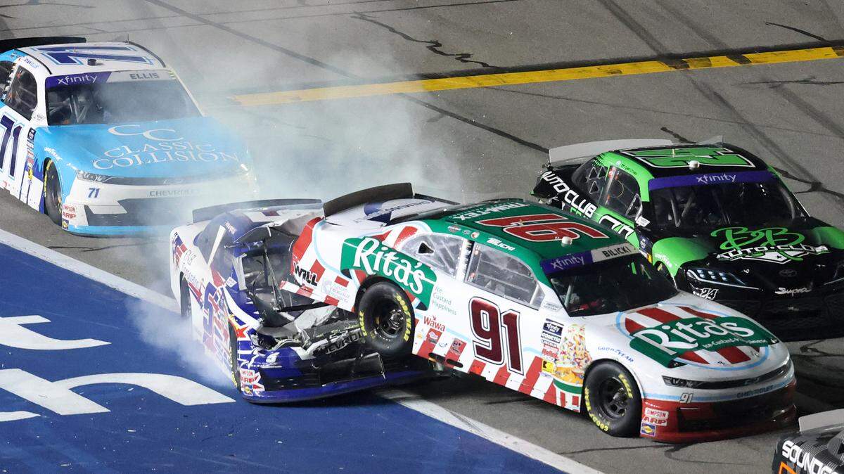 Feb 15, 2025; Daytona Beach, Florida, USA; Xfinity Series driver Kris Wright (5) crashes into driver Josh Bilicki (91) on pit road during the United Rentals 300 at Daytona International Speedway. Mandatory Credit: Mark J. Rebilas-Imagn Images
