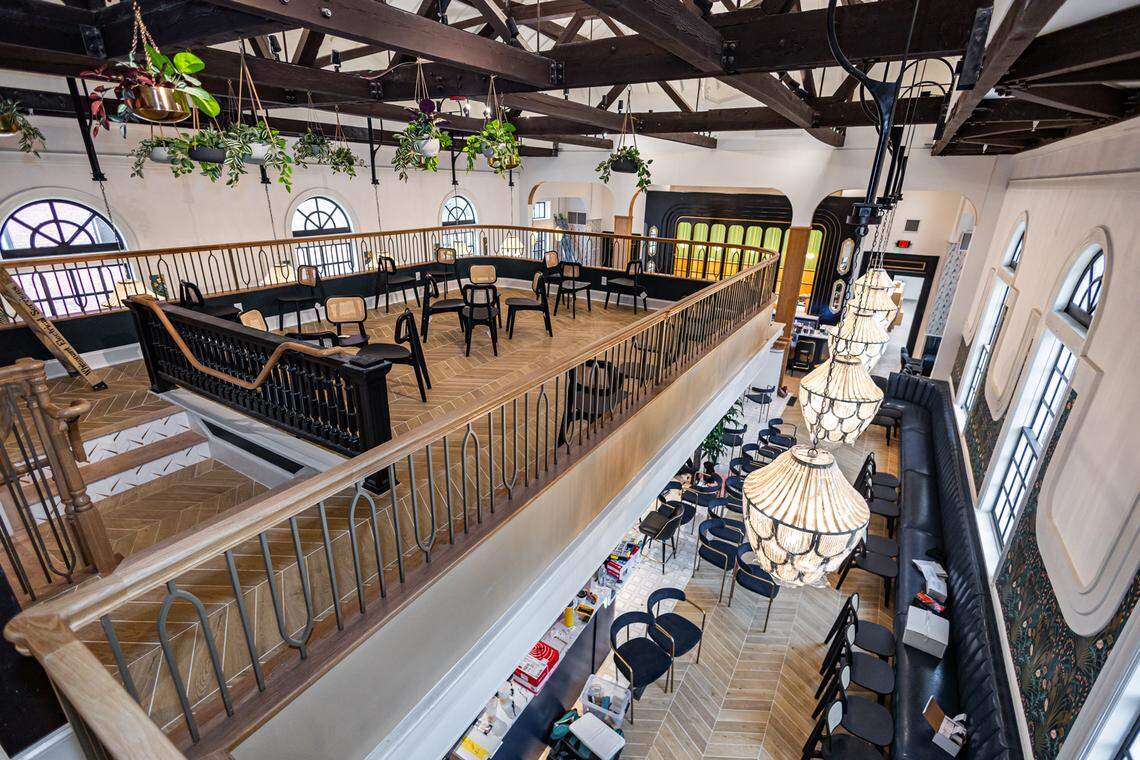 A mezzanine dining space overlooks the main dining room at Leluia Hall.