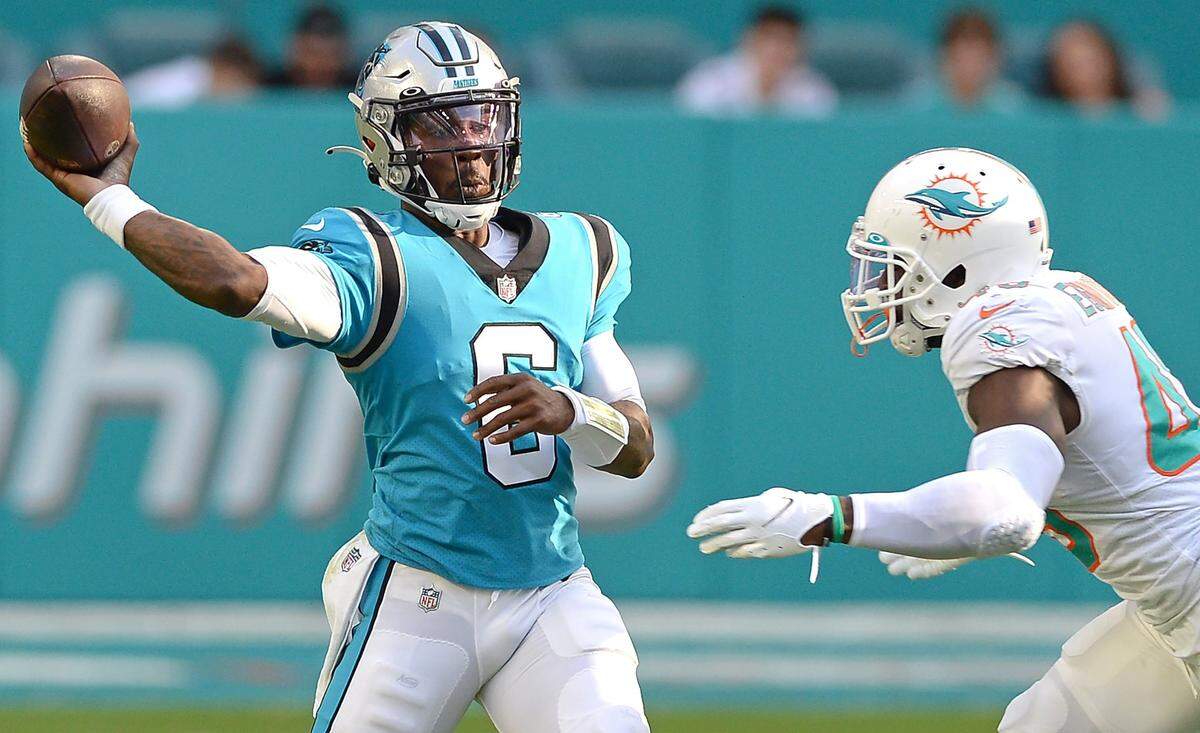 Carolina Panthers quarterback PJ Walker passes to a receiver during fourth-quarter action against the Miami Dolphins at Hard Rock Stadium in Miami Gardens, Fla. on Sunday, November 28, 2021. The Dolphins would defeat the Panthers 33-10 as Walker replaced an ineffective Cam Newton.