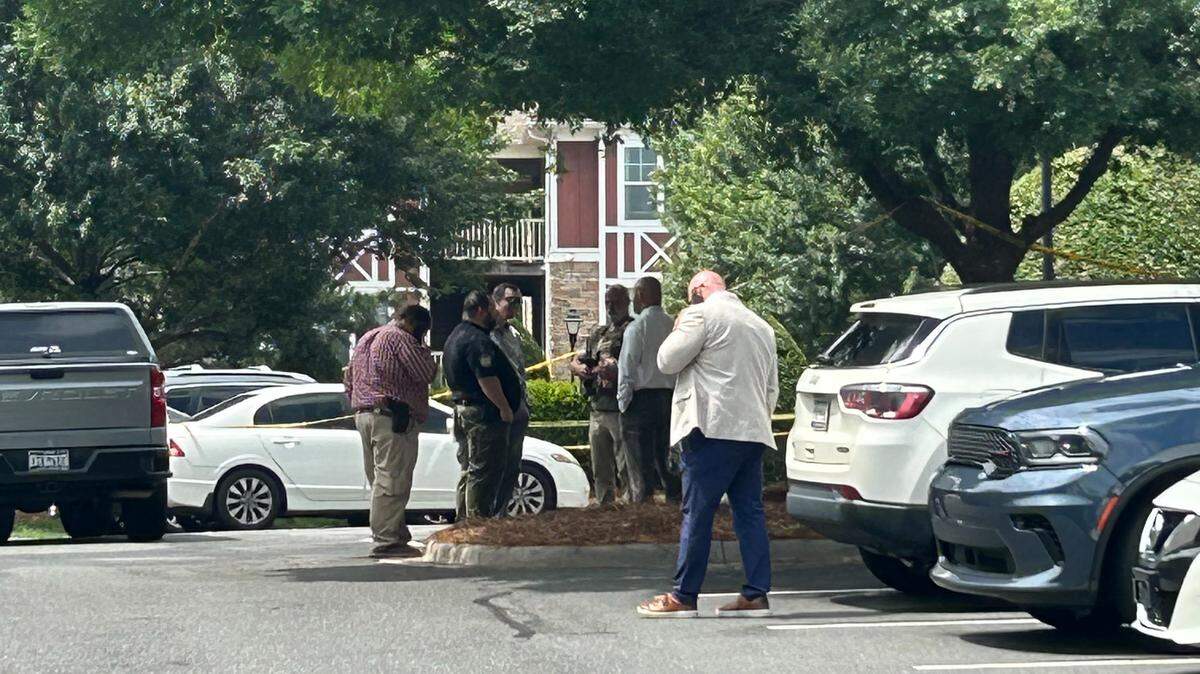 Investigators on a drug task force shot someone while doing a search at an apartment in Fort Mill on Tuesday.