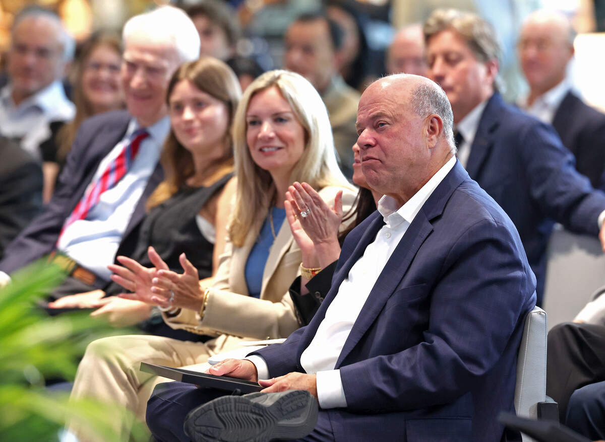 Carolina Panthers owner David Tepper listens as North Carolina Gov. Josh Stein awards the Order of the Long Leaf Pine to recipients at Bank of America Stadium on Wednesday, June 17, 2026. Tepper was honored with other recipients, including former Carolina Panthers wide receiver Steve Smith.
