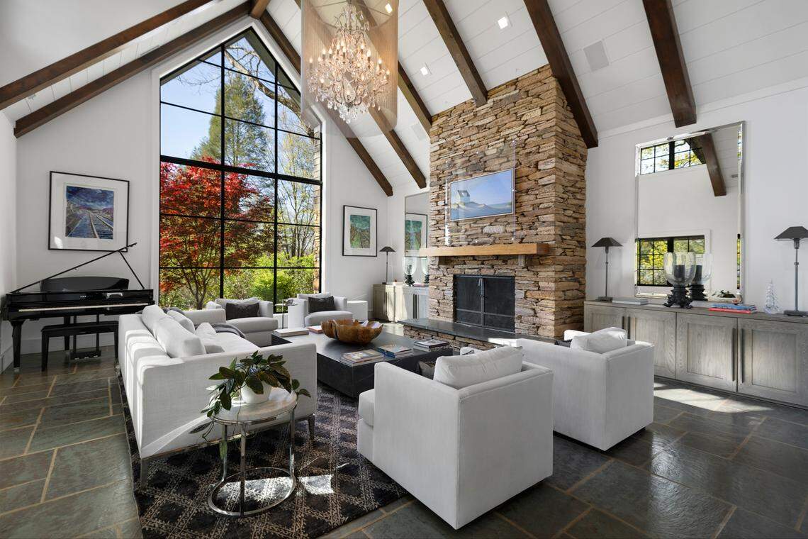 The estate includes a main home, pool house and two guest cottages.