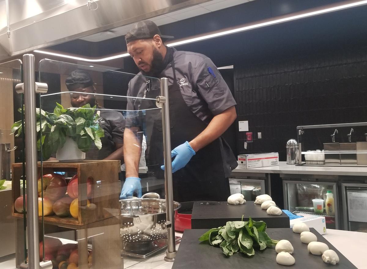 Wells Fargo opens its new food hall for more than 5,000 employees. It includes a chef demo station.