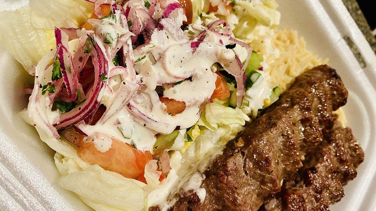A kebab with rice and salad from Halal Street Food.