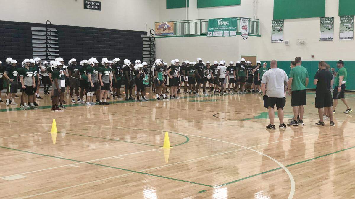 Heavy rains forced Myers Park’s high school football team to practice in the gym Friday. The Mustangs have only practiced outside once in the first five days of practice due to weather. Their first game is in two weeks.