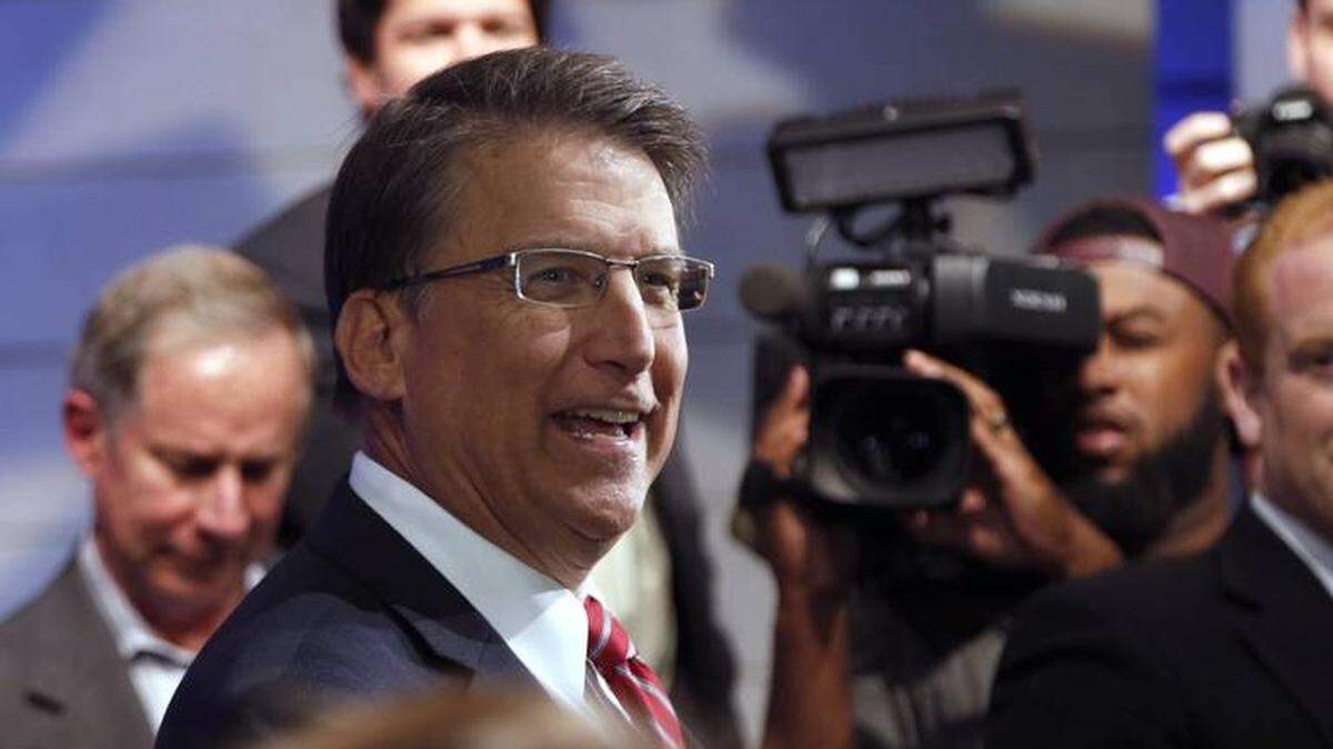 Gov. Pat McCrory talks with reporters at the end of a debate at WRAL studios in Raleigh on Oct. 18, 2016.