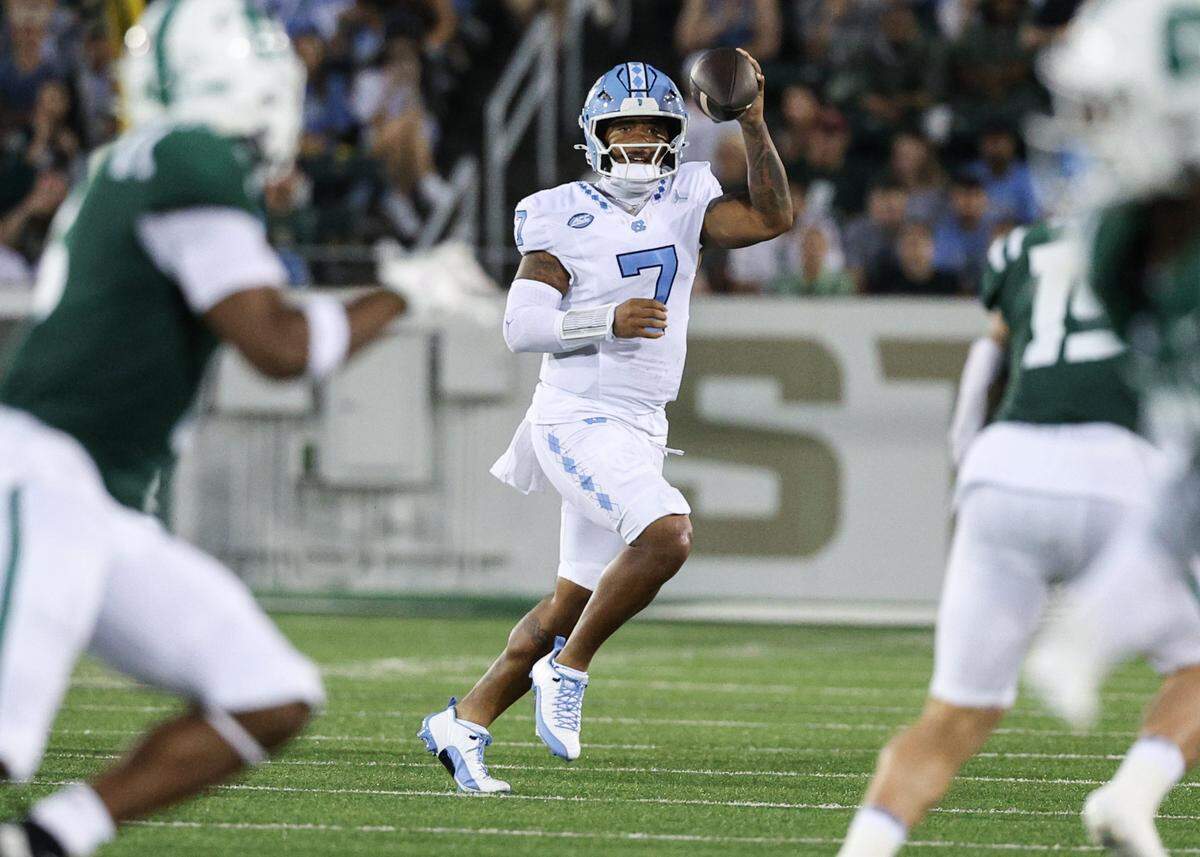 Chapel Hill quarterback Gio Lopez cocks his arm for a pass during the game against Charlotte at Jerry Richardson Stadium on Saturday, September 6, 2025. Chapel Hill held Charlotte to zero touchdowns, defeating them 20-3.