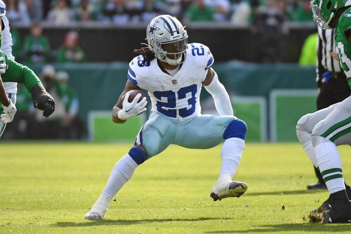 Dec 29, 2024; Philadelphia, Pennsylvania, USA; Dallas Cowboys running back Rico Dowdle (23) against the Philadelphia Eagles at Lincoln Financial Field. Mandatory Credit: Eric Hartline-Imagn Images