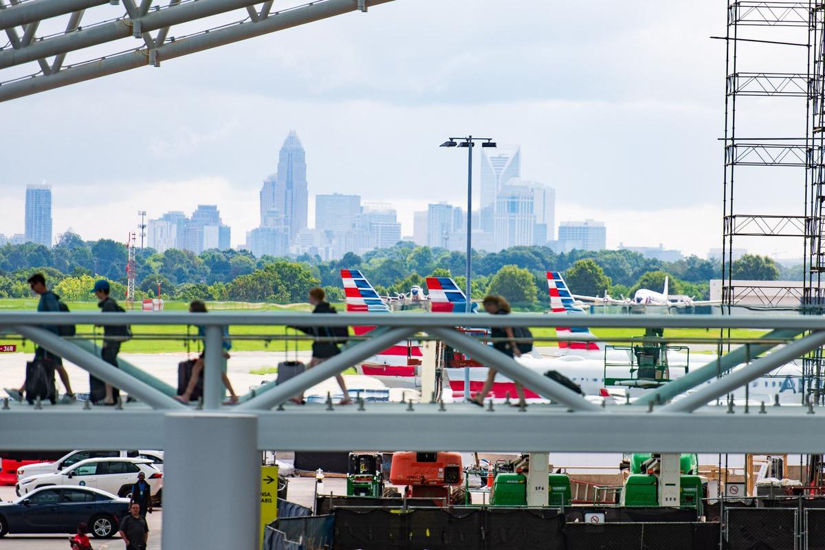 Travelers making their way to Charlotte Douglas International Airport on MOnday. Those at the airport Tuesday are still dealing with over 100 delays or cancellations from Tropical Storm Debby,