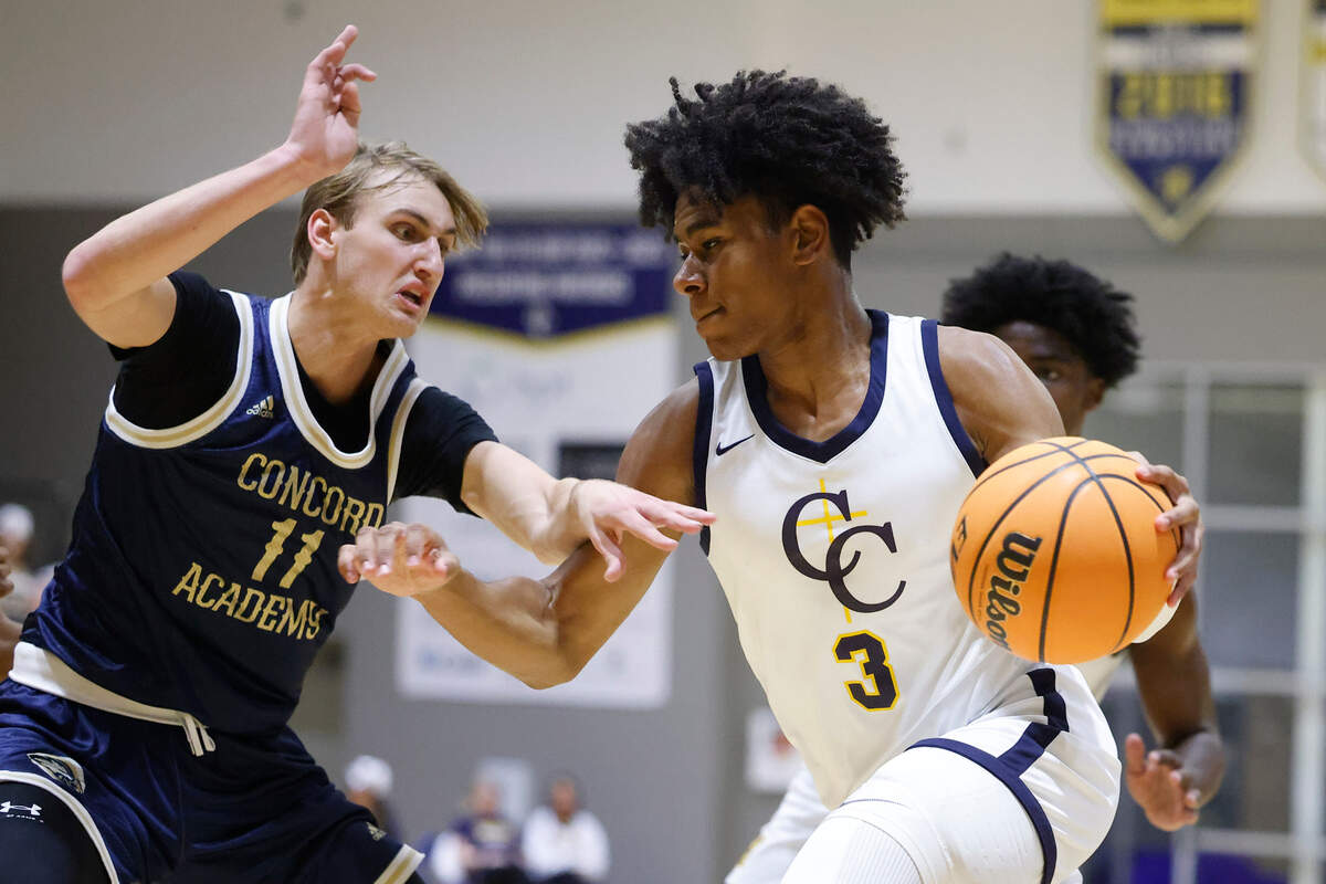 Carmel Christian’s Jaeden Mustaf (3) dribbles around Concord Academy’s Noah Van Bibber (11) during a game at Carmel Christian in Matthews, N.C., Tuesday, Nov. 22, 2022. Carmel Christian beat Concord Academy 59-52