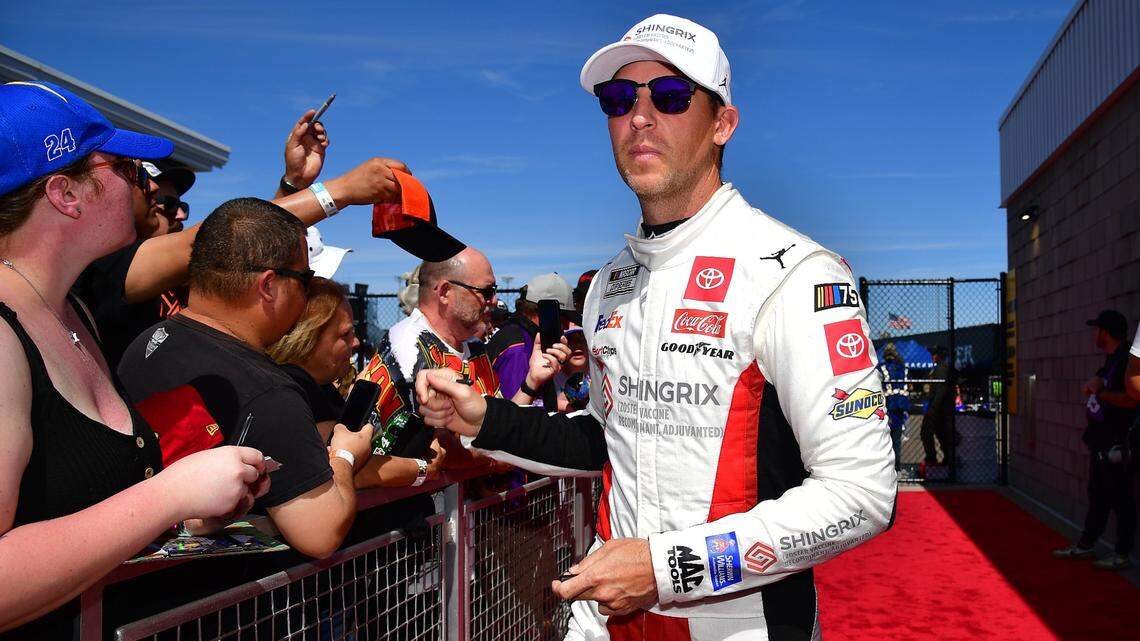 Mar 12, 2023; Avondale, Arizona, USA; NASCAR Cup Series driver Denny Hamlin (11) before the United Rentals Work United 500 at Phoenix Raceway. Mandatory Credit: Gary A. Vasquez-USA TODAY Sports
