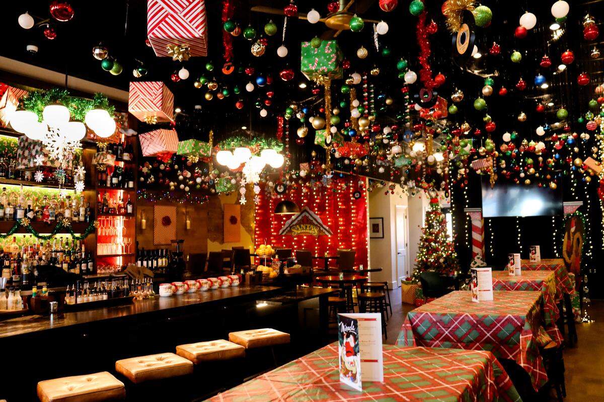 158 on Main at 158 N. Main St. in Mooresville is decorated with over 3,000 Christmas packages and bulbs hanging from the ceiling as part of the international holiday pop-up bar event called Miracle.