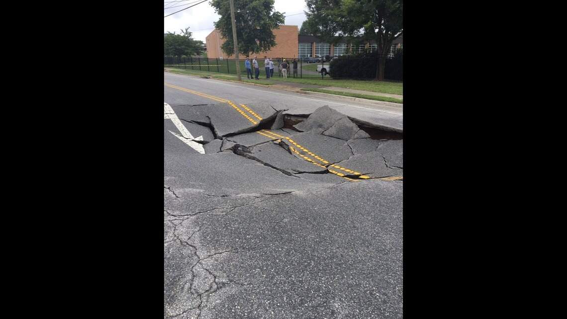 Huge sinkhole devours two lanes of a North Carolina roadway, picture shows