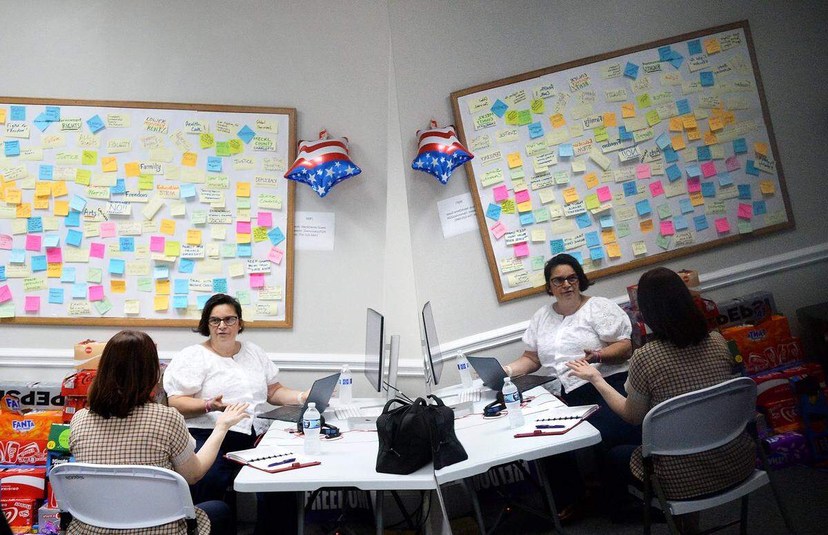 Volunteer Susan Moore, left, works with Allison Pinto, Mecklenburg County Democratic Party senior organizer, at party headquarters in Charlotte on Thursday, July 3, 2025. The election season for both Democrats and Republicans begins in early July.