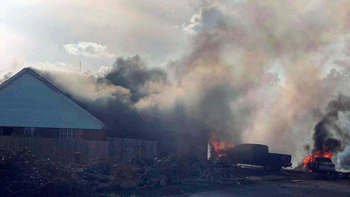 This photo provided by Greg Crippen shows the scene where a U.S. Navy training plane crashed in an Alabama residential neighborhood near the Gulf Coast, Friday, Oct. 23, 2020 near Foley, Ala.