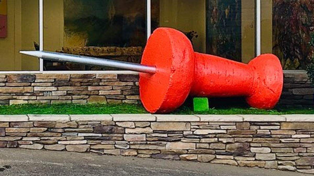 This 10-foot-long sculpture of a giant red thumbtack was stolen from outside the front entrance of its artist’s Hickory gallery late Tuesday, Feb. 27, 2024, or early Wednesday, Feb. 28.