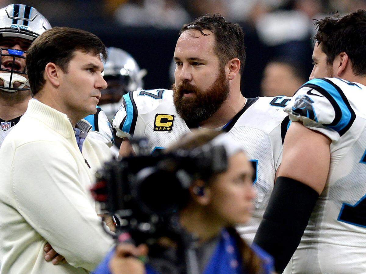 Former Panthers quarterback Jake Delhomme, left, talks with center Ryan Kalil. Delhomme led the Panthers to their first Super Bowl appearance, where he threw for 211 yards in the fourth quarter in a losing cause against New England.