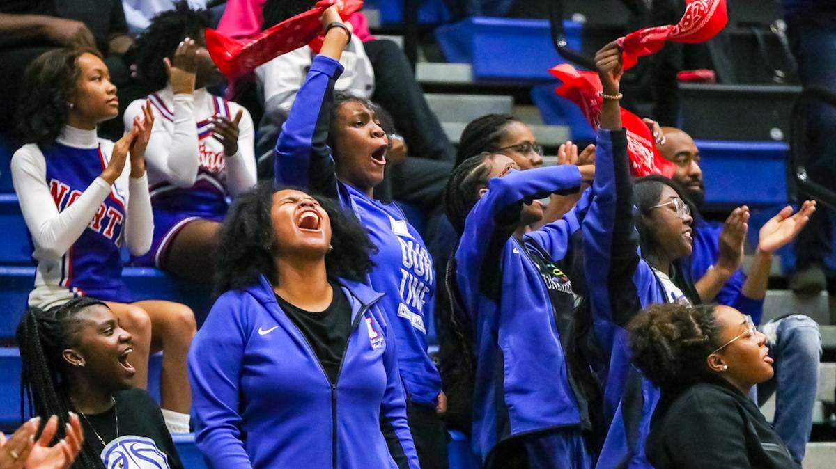 North Mecklenburg fans scream with excitement during a girls basketball game at Lake Norman.