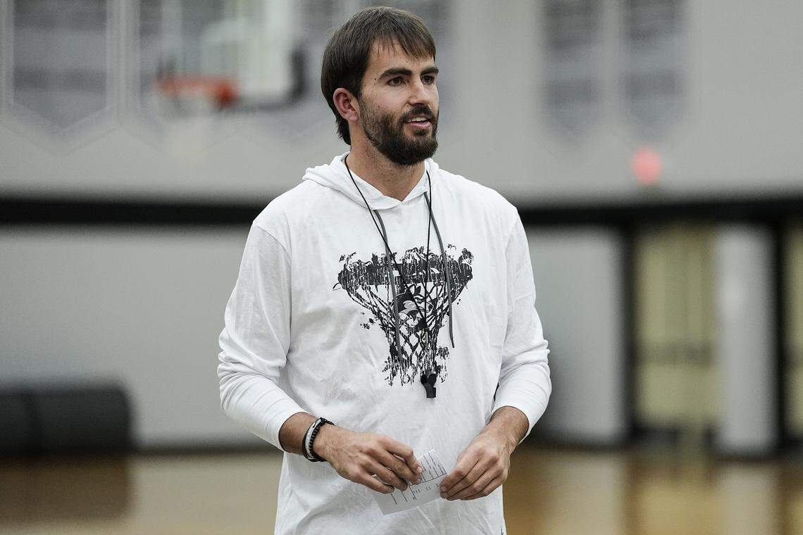Head basketball coach Beau Maye looks on during a boys varsity basketball practice at Hough High School, Monday, Nov. 10, 2025, in Cornelius, N.C.