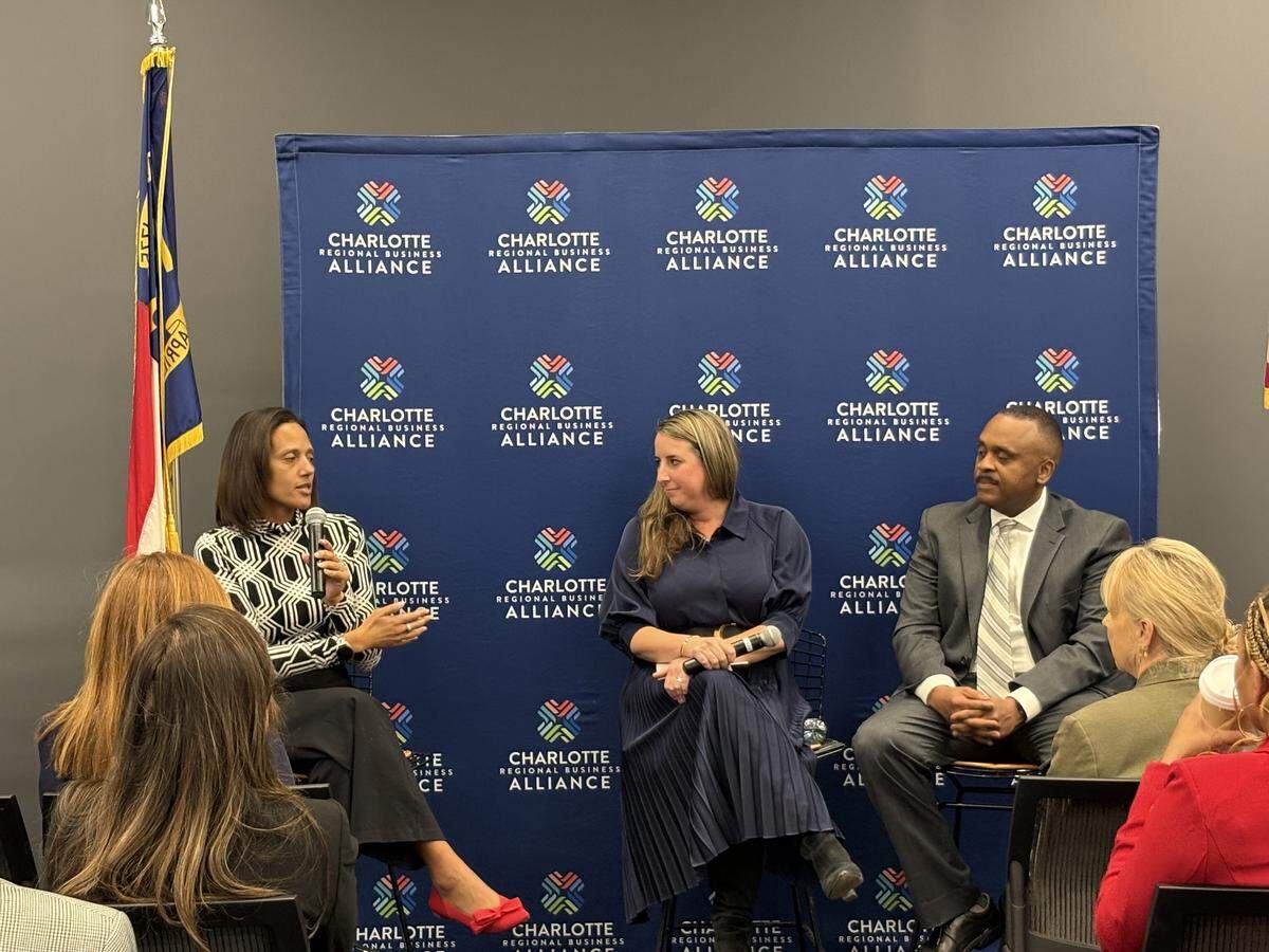North Carolina Senate Democratic Leader Sydney Batch, at left, and House Democratic Leader Robert Reives, at right, take questions at a Charlotte Regional Business Alliance event Feb. 26, 2026.